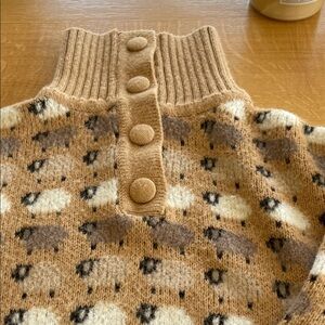 Cozy Tan Sheep Pattern Button-Neck Sweater